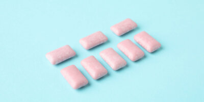 Chewing or bubble gum on blue background Chewing or bubble gum on blue background